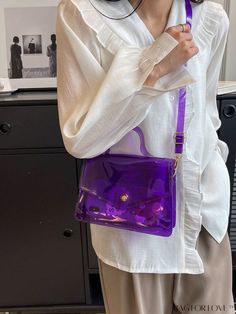 BagForLove - PVC Clear Square Bag with Top Handle and Funky Flap Product Description Color Purple Type Square Bag Bag Size Small Strap Type Top Handle Pattern Type Plain Style Fashionable Closure Type Flap Composition 100% Polyvinyl Chloride Material PVC Size Chart INCH CM Strap Length Bag Length Bag Width Bag Height Handle Height 43.3 inch 8.3 inch 2.8 inch 5.9 inch 3.5 inch Strap Length Bag Length Bag Width Bag Height Handle Height 110 cm 21 cm 7 cm 15 cm 9 cm Details Pictures Similar Products h2 { text-align: center; } /* æ¢è¡ */ li{ white-space: normal; word-break: break-all; word-wrap: break-word; } .red-box { width: 100%; display: flex; flex-direction: row; flex-wrap: wrap; justify-content: center; } .red-box > div { width: 190px; height: 250px; margin: 10px; } .red-box > div > a > Trendy Plastic Bag As Gift, Portable Rectangular Plastic Bag, Portable Purple Satchel Shoulder Bag, Plastic Shoulder Bag, Trendy Plastic Satchel Bag, Trendy Plastic Satchel Shoulder Bag, Purple Satchel Shoulder Bag, Purple Portable Bags For Daily Use, Plastic Satchel Shoulder Bag