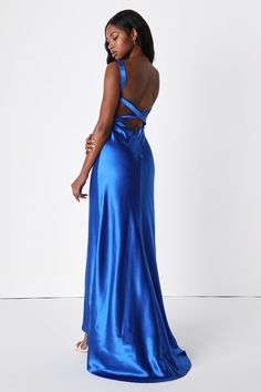 The Lulus Perfectly Classy Royal Blue Satin Strappy Maxi Dress brings the perfect amount of sexy meets chic! Fall in love with this sleek woven satin dress that features a V-neckline and wide straps that flow into a strappy back. A darted bodice carries into a figure-skimming silhouette that ends at a maxi length hem with a small train at the back. Hidden back zipper/clasp. Fit: This garment fits true to size. Length: Floor length. Size medium measures 66" from shoulder to hem. Bust: Great for a Silk Prom Dress, Blue Satin Dress, Prom Dress Inspo, Strappy Maxi Dress, Blue Dress Formal, Sophia Bush, Formal Dresses Gowns, Prom Dress Inspiration, Cute Prom Dresses