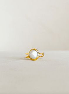 Single Pearl Ring Adjustable Stackable Pearl Ring In Fine Jewelry Style, Minimalist Adjustable Moonstone Ring With Natural Stones, Gold Moonstone Open Ring With Natural Stones, Modern Adjustable Dome Ring As Gift, Adjustable Stackable Dome Ring, Elegant Adjustable Yellow Gold Moonstone Ring, Gold Open Ring With Natural Stones, Adjustable Minimalist Moonstone Ring As Gift, Minimalist Adjustable Moonstone Ring As Gift