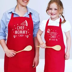 two girls in red aprons holding wooden spoons with the words chef mommy and little chef written on them