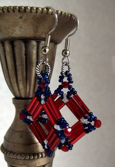 "P7 Red, White and Blue dangling square earrings. Dangle measures approx. 1\"X 1\" Can always request a different color scheme." Handmade Blue Patriotic Earrings, Patriotic Red Drop Earrings, Patriotic Blue Earrings For Gift, Handmade Patriotic Red Jewelry, Blue Square Earrings For Gift, Patriotic Handmade Earrings As A Gift, Handmade Square Red Jewelry, Patriotic Handmade Earrings For Gift, Superduo Earrings