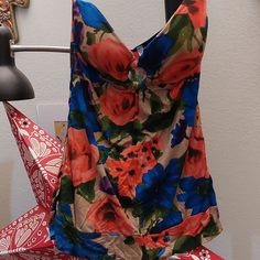 Super Pretty And Cute Strapless Floral Top. Lightly Padded Cups For Support With A Keyhole Opening. Tan Background With Bright Coral And Blue Flowers. Brand New Never Worn Summer Multicolor Tops With Built-in Bra, Casual Multicolor Tops With Built-in Bra, Spring Poolside Tank Top With Built-in Bra, Fitted Multicolor Tops With Built-in Bra, Casual Multicolor Top With Built-in Bra, Fitted Floral Print Tank Top For Beach Season, Summer Floral Print Tops For Poolside, Spring Poolside Tank Top, Multicolor Stretch Beachwear Tops