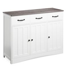 a white cabinet with two doors and three drawers on one side, an open drawer at the top