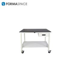 a white and black table with drawers on wheels