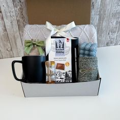 a gift box with coffee, tea and candies