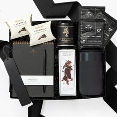 the contents of a coffee gift box are neatly organized