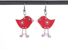 These cute little enamel bird earrings are happily singing to each other. Gorgeous in their red spotty polka dot feather coats, the hand-painted whimsical dangle earrings are the perfect fun accessory for any lady. Add a touch of whimsy to your outfit for a really fun look. Whatever the occasion, these unique red enamel bird earrings are going to wow your colleagues, friends, and family. They will look fabulous no matter what you're wearing. For every day, you can wear them with a pair of jeans Feather Coat, Funny Earrings, Quirky Jewelry, Jewelry Colorful, Whimsical Jewelry, Dog Earrings, Earrings Handmade Dangle, Killer Heels, Bird Earrings