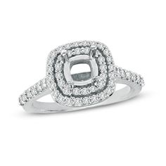 a white gold ring with two rows of diamonds in the center and an interlocked band