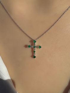 "A timeless and classic design, symbolizing faith and love. Perfect for everyday wear or dressed up for special occasions. Make a bold statement in our Genuine Emerald and Diamond Cross Pendant, available in 18k solid white gold and 18k solid yellow gold.  Item Specifications: Materials: 18k Solid Gold  Gemstone: Natural Emerald Pendant Diameter 17.6 mm x 13 mm Total Gold Weight: 0.61 ct. Total Emerald Weight: 0.32 ct.  Total Diamond Weight: 0.11 ct. Diamond Clarity: SI 1-2  Diamond Color: G color ★  Each order will be beautifully packaged in a jewelry box and comes with a drawstring pouch that's perfect for travel. LiebeJewelry's products are handcrafted and all materials are genuine and ethically sourced. Our products are made with genuine materials and will not irritate the skin. If you Formal Spiritual Crucifix Jewelry, Luxury Cross Gemstone Jewelry, Luxury Gemstone Cross Jewelry, Luxury Cross-shaped Gemstone Jewelry, Classic May Birthstone Jewelry, Tarnish Resistant, Classic May Birthstone Jewelry Tarnish Resistant, Classic Crucifix Jewelry With Polished Finish, Classic May Birthstone Jewelry, Classic Polished Crucifix Jewelry