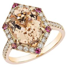 This collection includes a range of Morganite, which is a symbol of love and relationships, making it an excellent choice for a variety of applications. Accented with pink tourmaline and White Diamond this ring is made in Rose Gold and presents a classic yet elegant look. Morganite and Tourmaline Fancy Ring in 18Karat Yellow Gold with White Diamond. Morganite: 3.29 carat, 11x9mm size, oval shape. Pink Tourmaline: 0.12 carat, 1.70mm size, round shape. White Diamond: 0.21 carat, 1.40mm size, round Luxury Morganite Ring With Accent Stones, Wedding Jewelry With Morganite Gemstone Accents, Morganite Wedding Jewelry With Gemstone Accents, Morganite Rings With Gemstone Accents, Fine Jewelry, Elegant Morganite Ring With Gemstone Accents, Round Morganite Jewelry With Gemstone Accents, Exquisite Morganite Rings, Luxury Tourmaline Jewelry With Halo Setting, Morganite Jewelry With Gemstone Accents