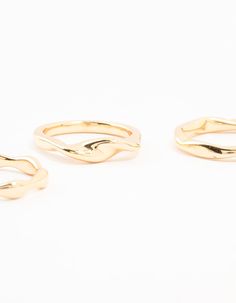 Rock this chic trio of gold-plated stacking rings for eye-catching flair. The irregular, asymmetrical silhouettes and stackable design lets you mix and match for endless styling possibilities. Slip these on and let your fashion-forward style shine. Material: Gold Plated Dimensions: Diameter 17 mm x Band Width 1 mm | Lovisa Gold Plated Irregular Stacking Rings 3-Pack, Size: Small/Medium, Silver Stacking Rings, Mix And Match, Fashion Forward, Gold Plate, Plating, Size Small, Band, Silver, Gold