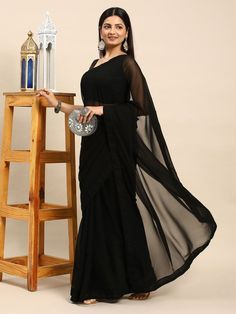 Welcome To Our Store Black Pure silk  Traditional Wear Women Designer Saree Party Wear Saree Wedding Wear Saree Description  The saree is crafted with high-quality materials to ensure both comfort and durability, making it perfect for special occasions or formal events. Complete your look with a classic pearl necklace for a timeless and sophisticated finish.  Embrace the beauty and grace of Bollywood fashion with this must-have piece that effortlessly combines tradition with modern glamour. Make Festive Black Pre-draped Saree With Self Design, Formal Pre-draped Chanderi Saree With Self Design, Anarkali Style Pre-draped Saree With Unstitched Blouse, Evening Semi-stitched Traditional Wear For Navratri, Party Floor-length Art Silk Pre-draped Saree, Formal Anarkali Chanderi Pre-draped Saree, Anarkali Style Chanderi Pre-draped Saree For Formal Occasions, Semi-stitched Black Art Silk Blouse Piece, Formal Art Silk Pre-draped Saree With Self Design