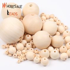 several wooden beads are arranged next to each other