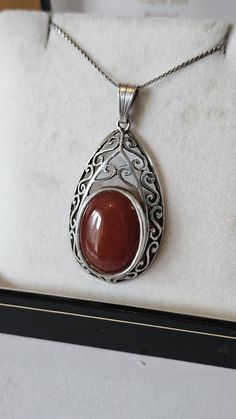 Please inspect photos for condition. Any questions please ask. All items are vintage or Antique and may have slight defects. Postage within 2 days of payment. Thank you for checking out my listing 😊 Vintage Carnelian Engraved Jewelry, Vintage Gemstone Necklace With Oval Cabochon, Vintage Oval Gemstone Necklace, Vintage Hallmarked Oval Cabochon Necklace, Antique Oval Carnelian Jewelry, Vintage Brown Hallmarked Jewelry, Collectible Vintage Teardrop Necklace, Antique Carnelian Pendant Necklace, Antique Carnelian Necklace For Gift