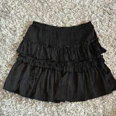 Brand New And Never Worn Black Skirt! Frilly Black Skirt, Black Skirt Ruffle, Whimsigoth Mini Skirt, Casual Flowy Skirt For Date Night, Casual Tiered Skirt For Date Night, Black Ruffled Skirt For Spring, Black Tiered Skirt For Spring, Black Tiered Summer Skirt, Casual Black Skort With Ruffles