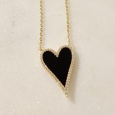 Share the LOVE- with our Lyndsey CZ heart necklace - the less expensive little sib to our Kendall + Riley, but she shines just as bright! The perfect combo of affordable and adorably chic. Let this beauty serve as a reminder to always stay true to your heart. (And hey, looks damn good doing it!). BONUS! Flip Lyndsey (or Riley, or Kendall...) backwards for another style option!! Black Necklaces For Anniversary On Valentine's Day, Black Necklace For Anniversary On Valentine's Day, Valentine's Day Black Necklace For Anniversary, Elegant Black Open Heart Necklace, Black Heart Necklace With Adjustable Chain For Valentine's Day, Black Heart-shaped Jewelry With Adjustable Chain, Black Heart Shaped Jewelry With Adjustable Chain, Black Open Heart Necklaces For Valentine's Day, Black Double Heart Necklace For Anniversary