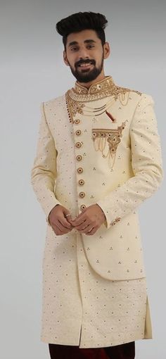 Details : Color -Cream Any Color you may ask for...(one colour) Fabric Important Fabric Work Details ;Embroidery Bottom Details -marron- Pajama Package Include : Top , Bottom,, All others accessories are for photography purpose only . Just the Top and bottom available . Color variation may be there slightly , due to computer resolution and camera . Beige Traditional Sherwani For Festive Occasions, Beige Bandhgala With Zari Work And Traditional Drape, Gold Floor-length Sherwani For Reception, Festive Beige Traditional Wear With Gold Embroidery, Festive Beige Traditional Wear With Intricate Embroidery, Festive Beige Sherwani With Intricate Embroidery, Gold Floor-length Sherwani For Wedding, Beige Kurta With Zari Work For Reception, Embroidered Beige Kurta For Reception