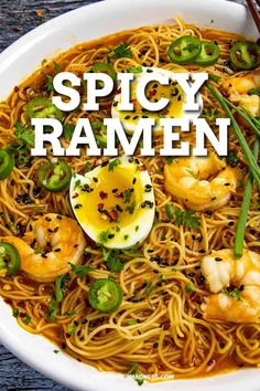 spicy ramen with shrimp, scallops and green onions in a white bowl