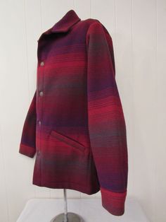 "Vintage 1970s wool blanket Pendleton jacket. Made of red, purple and gray wool. Southwestern cowboy styling. Features: a button front and two pockets. Label: Pendleton, High Grade western Wear. Size medium. Actual measurements are: 46\" at the chest 46\" at the waist 20\" shoulder seam to shoulder seam 24.5\" shoulder seam to cuff 31\" overall length In excellent condition." Western Style Winter Outerwear With Snap Buttons, Western Style Outerwear With Buttons For Fall, Vintage Purple Outerwear For Fall, Southwestern Jacket, Wool Ideas, Cowboy Jacket, Pendleton Jacket, Western Jacket, Pendleton Wool