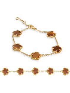 From the Flower Collection..Tiger eye stone.14K goldplated brass.Lobster clasp.Imported.SIZE.Length, about 6.75'-8'.Diameter, about 3.375'-4'.Click here for a Guide to Jewelry & Watches.From the Flower Collection.Tiger eye stone14K goldplated brassLobster claspImportedSIZELength, about 6.75'-8'Diameter, about 3.375'-4'.Click here for a Guide to Jewelry & Watches.Chains & Strands.Jewelry.Women's.Bracelets Classic Gold Jewelry In Flower Shape, Classic Gold Jewelry With Flower Charm, Classic Flower Gemstone Jewelry, Classic Flower-shaped Gemstone Jewelry, Gold Bracelet With Flower Charm And Round Shape, Gold Bracelet With Flower Charm, Gold Flower Shaped Jewelry With Gemstone, Gold Flower-shaped Gemstone Jewelry, Gold Flower Gemstone Jewelry