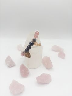 This beautiful Love Potion was created with attracting your perfect soul mate in mind. It contains 5 beautiful stones: Rose Quartz - Stone of love, the crystal emits strong vibration of unconditional love, joy, warmth and emotional healing. Expands the heart energy; Helps to heal relationship problems. Strawberry Quartz - A stone of self-love & understanding, It encourages you to be your best & most authentic self. It represents life & growth, passion & sexuality, love & affection. Garnet - The stone inspires love and devotion, balances the sex drive and alleviates emotional disharmony in the wearer. Pink Zebra Jasper - It is believed to bring stability to oneself or stability for two hearts to settle down. It’s believed to create a sense of security, stability, grounding and promotes a re Heart-shaped Spiritual Bracelets For Mother's Day, Spiritual Heart-shaped Bracelets For Mother's Day, Spiritual Heart Bracelets For Mother's Day, Spiritual Heart Beads Bracelet Gift, Spiritual Rose Quartz Jewelry For Friendship, Spiritual Heart Charm Bracelet For Gift, Spiritual Heart Bracelet With Charm As Gift, Spiritual Heart Bracelet With Heart Charm For Gift, Spiritual Heart Beads Bracelet