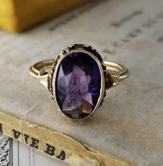 Beautiful 1950s vintage silver amethyst ring, US Size 6 1/2, in good vintage condition. Box on the photos not included! Diameter: approx. 14 mm (0.5 inch) Material: 925 silver, amethyst total weight: 3 g US Size: approx. 6 1/2 (EU size 53 1/2) A stunning religious shop well worth a visit ... https://etsy.me/2NNNK4g Vintage Silver Amethyst Ring Gift, Adjustable Vintage Sterling Silver Amethyst Ring, Vintage Cabochon Amethyst Ring Gift, Antique Sterling Silver Hallmarked Amethyst Ring, Vintage Silver-toned Amethyst Ring Gift, German Silver, Multi Stone, 1950s Vintage, Multi Stone Ring