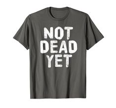 PRICES MAY VARY. Popular fun Not dead yet t-shirt. Best funny gift for the men, women or kids you love such as friend, grandpa, mama, boyfriend, daughter, co-worker, girlfriend, mom, daddy, husband, colleague, mother. Pair with decorations, costume, flag, outfit,... Looking for a cool adult, toddler, boy or girl present for him or her? This sarcasm quote gag saying is a cute gift for any holiday such as Graduation, Christmas, Father's Day, Halloween, anniversary, Veteran's Day, Memorial Day, bir Funny Dad Shirt, Zombie Sayings, Halloween T Shirt Ideas, Halloween Anniversary, Sarcasm Quote, Tshirt Quotes, Funny Tshirt Quotes, Halloween Text, Zombie T Shirt