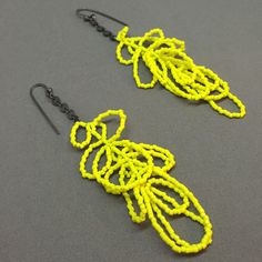 these are some of my personal super faves. there is never too much neon yellow!!!! Handmade Neon Yellow Jewelry For Summer, Art Earrings, Beaded Dangles, Neon Yellow, Austin Tx, Chandelier Earrings, New Photo, Rope Bracelet, Too Much