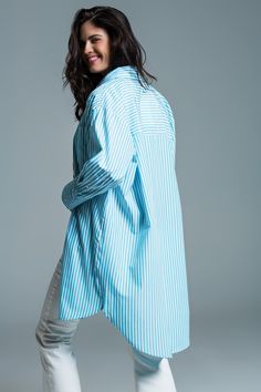 Step into summer with style in our Light Blue Oversized Stripe Blouse, a blend of casual elegance and breezy comfort, making it an ideal choice for your sunny day adventures. Lightweight and Airy Fabric: Made from 100% Polyester, this blouse is designed to offer both comfort and durability, perfect for those warm, sunny days. Refreshing Color and Design: Adorned with classic white stripes set against a serene light blue background, this blouse offers a refreshing aesthetic suitable for any summe Refreshing Aesthetic, Oversize Blouse, Blouse Collar, Stripe Blouse, Oversized Blouse, White Skirt, Polo Collar, Casual Elegance, Striped Blouse