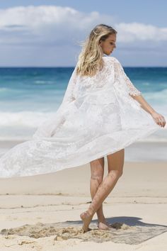 Welcome to the Suzi Rose designs shop Website: www.suzirose.com Instagram: suzi_rose_designs Design details - White lace kimono robe in a beautiful soft flowing french style lace. - Designed for a lose fit. Perfect for the bride to wear on the wedding day over a white slip (We also sell the slips separately) or perfect for any beach holiday or amazing piece to throw over an outfit for the festival seasons - Kimono comes with a white satin belt sash so you can close the robe around the waist - St Fitted White Wedding Kimono, White Bohemian Wrap Dress, Beach Season Wedding Dresses, Lace Wedding Kimono With Kimono Sleeves, White Open Front Kimono For Festival, White Lace Wedding Kimono, White Wrap Beach Dress, White Open Front Dress For Beach Cover-up, White Wrap Dress For Beach