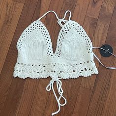 Brand New With Tags Lulus Crochet Halter Top Bralette Crop Top Size M/L 100% Cotton Hand Wash Hang To Dry White Crochet Triangle Halter Top, Cotton Halter Neck Crop Top With Built-in Bra, Bohemian Halter Top With Built-in Bra, Beach Halter Top With V-neck And Built-in Bra, Beach Halter Top With Built-in Bra And V-neck, Crochet Halter Top, Bralette Crop Top, Crochet Halter, Crochet Halter Tops