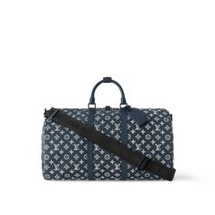 Monogram shadow calfskin gives this keepall bandoulière 50 travel bag a sporty feel. The monogram pattern is first embossed into the soft calfskin, and then the motif is printed on top in a contrasting color. The process gives depth to the design. The roomy keepall 50 can be taken onto the plane as carry-on luggage. Trunk Bag, Monogram Bag