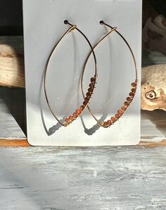 Ten unique styles of handmade/wired/beaded earrings. Each set is made from either copper, bronze, silver plated, gold plater or titanium plated wire.  Nickel and lead safe. Rose Gold Brass Hoop Earrings With Ear Wire, Rose Gold Hoop Earrings With Brass, Handmade Drop Wrap Earrings For Everyday, Hypoallergenic Rose Gold Brass Earrings, Handmade Metal Dangle Wrap Earrings, Wire Wrapped Metal Drop Earrings, Rose Gold Teardrop Earrings Gift, Nickel-free Small Hoop Metal Beaded Earrings, Handmade Adjustable Dangle Wrap Earrings