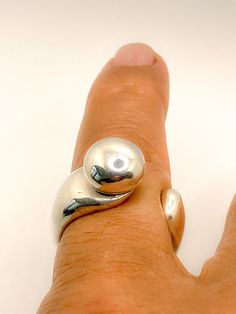 Fab little pinky ring, Tribal inspired, in my rustic sterling style, weighty at 22.18 grams solid sterling silver, hallmarked , as are all my rings and a UK L 1/2 to M and a US size 6-6.5 Adjustable Sterling Silver Dome Ring With Polished Finish, Unique Silver Stackable Rings With Polished Finish, Unique Silver Stackable Rings Hallmarked, Unique Sterling Silver Dome Ring, Unique Sterling Silver Round Band Ring, Unique Silver Stackable Rings With Round Band, Hand Cast Sterling Silver Stackable Rings, Handmade Unique Sterling Silver Dome Ring, Pinky Finger Ring