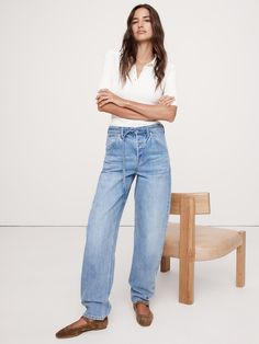 Also called a "horseshoe jean", this high-rise jean has a fitted hip and a signature, wide barrel-leg shape.  Here we cut it in a 100% cotton denim so it molds to you with every wear.  Bow Fit: High-rise (12").  Fitted through the hips with a dramatic barrel leg that tapers towards the hem.  Full length.  Regenerative Cotton: This style is made with cotton sourced from Regenagri® certified farms using regenerative farming practices, ones that aim to improve biodiversity and secure the health of Bow Jeans, Regenerative Farming, Belt Bow, Petite Shorts, Petite Women, Bottom Clothes, High Rise Jeans, Casual Style, Womens Tees