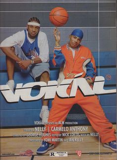 two men in orange and blue outfits holding a basketball