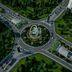 an aerial view of a roundabout in the middle of a city