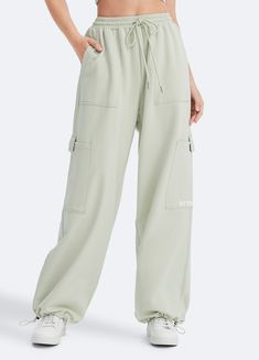 Embrace roomy wide legs and a stretchy fit for ultimate comfort, paired with a flattering high waist for added style. Whether it's grocery runs, lazy Sundays, or a casual hangout, these joggers have you covered in relaxed elegance. Loosely Fitted Cargo Sweatpants For Loungewear, Trendy Oversized Bottoms For Leisure, Comfortable Wide Leg Sweatpants For Elevated Casual Wear, Oversized Wide Leg Leisure Bottoms, Oversized Wide Leg Bottoms For Leisure, Comfortable Oversized Bottoms With Side Pockets, Wide Leg Pants With Pockets For Leisure, High Waist Relaxed Fit Leisure Bottoms, Comfortable Wide Leg Bottoms For Streetwear