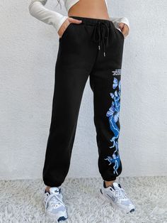 Turn heads on the track or in the gym with these joggers that have a high-waist design, a drawstring closure and stretchy, comfortable fabric. Size Guide: Alina is 5’7” tall, and has a 31.1” bust, 22.8” waist, & 34.6” hips. She is wearing a S / US 4 / AU 8. This pants is true to size. Material: 65% polyester / 35% cotton Feature: Relax fit, Graphic print, Twin hip pockets Care Instructions: Machine wash / Cold hand wash Tiered Skirt Pattern, Mini Skirt Pattern, Butterfly Pants, Printed Sweatpants, Cuffed Joggers, Black Lightning, Drawstring Jogger, Yellow Lace, Pinafore Dress