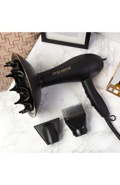 What it is: A hair dryer with a revolutionary diffuser designed specifically with the needs of wavy, curly and coily hair types in mind.Who it's for: Ideal for all hair types.What it does: This hair dryer and diffuser uses the latest and greatest technology to make drying your hair as easy as possible. The diffuser is huge, so it covers more hair at the same time. It features an even airflow that helps keep frizz to a minimum. The dryer provides even, gentle heat to minimize damage. It even has Hair Dryer And Diffuser, Hair Dryer With Diffuser, Defusers For Hair, Diffuser Blow Dryer Curly Hair, Diffuser For Hair, Defusers For Curly Hair, Best Diffuser For Curly Hair, Hair Electronics, Hair Diffuser Curly