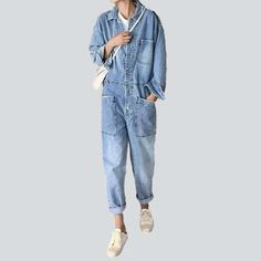 Our 2023 Spring-Summer Collection is here to bring back the nostalgia with these Nineties-inspired buttoned closure women's jeans overall! Bleached to perfection. these oversized denim shorts embody a rebellious attitude and grunge elegance. With their edgy distressed pattern and a blend of a resilient zipper and a stylish button. this is a dream denim come true!Unique Features: 90s Grunge Vibes ââ‚?Crafted to capture the spirit of the iconic '90s grunge movement. these shorts exude an effortles Casual Cotton Denim Jumpsuit With Buttons, Casual Relaxed Fit Jumpsuits And Rompers With Buttons, Summer Utility Jumpsuits And Rompers, Trendy Summer Overalls With Buttons, Baggy Denim Jeans With Buttons, Oversized Distressed Jeans For Summer, High-waist Denim Utility Jumpsuit, Utility Jumpsuits And Rompers With Pockets In Medium Wash, High-waisted Denim Utility Jumpsuit Or Romper