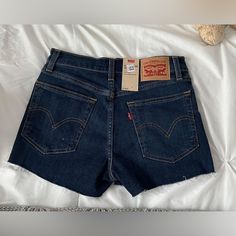 Levi’s Dark Blue Denim Shorts. Perfect For Summer And Cute Or Casual Outfits! Never Worn, Still Has Tags, Brand New! Soft Material, Flattering, Can Stretch If Needed To Fit! No Stains, Holes, Or Flaws. Levi's Dark Wash Cutoff Jeans, Levi's Straight Leg Dark Wash Shorts, Levi's Blue Shorts With Frayed Hem, Levi's Cutoff Dark Wash Jean Shorts, Levi's Cutoff Dark Wash Shorts, Levi's Dark Wash Cotton Jean Shorts, Levi's Dark Wash Short Jean Shorts, Levi's Dark Wash Jean Shorts, Levi's Dark Wash Shorts With Frayed Hem