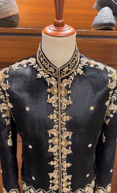 Coat For Groom Wedding, Black Sherwani With Gold Embroidery For Eid, Black Dabka Sherwani For Groom, Black Long Sleeve Traditional Wear For Groom, Black Long Sleeve Sherwani For Groom, Elegant Fitted Outerwear For Festivals, Black Sherwani For Groom For Festivals, Black Sherwani For Groom At Festivals, Black Sherwani For Winter Wedding