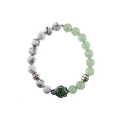 the green and white beaded bracelet has a turtle charm on it's side