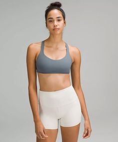 Size 4 Lululemon Activewear With Built-in Bra For Yoga, Lululemon Sports Bra With Built-in Bra For Workout, Lululemon Sports Bra With Built-in Bra For Gym, Lululemon Stretch Bra For Pilates, Lululemon Racerback Activewear For Pilates, Lululemon Bra For Pilates With Light Support, Lululemon Light Support Bra For Pilates, Versatile Lululemon Activewear, Bra Friendly, Lululemon Activewear With Removable Bra Pads For Yoga