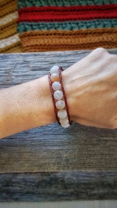 Embracing the transformative power of nature's bounty with every glance at your wrist. Details- -10mm Druzy Agate -2mm leather cord, Rustic Red -.5mm S-lon beading cord -22mm Sun Sheild button Adjustable!- -Fits wrist size 7"-8.5" -------------------------------------- 〰 All materials are purchased from other small business shops, many of them right here on Etsy. Thank you so much for looking, and please message me anytime with questions or custom requests!    〰 Ready to ship. Everything listed is already made and I'm available to ship asap with any order. Custom orders will be determined as they come in, but Id like to average an ASAP approach there also.   〰 Custom or otherwise personalized requests are welcome!! The creative process of putting something together for someone else specifi Gifts Under 25, Nature Vibes, Beading Cord, Boho Beachy, Nature's Bounty, Bracelet Boho, Druzy Agate, Shop Small Business, Boho Beach