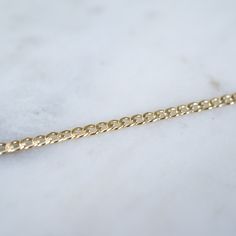 "14k Gold filled Curb Link Bracelet Our new 14k Gold filled Chain and Link Bracelets are a classic addition to your ring collection. If you would like a smaller size than a 6.5\", Please make a comment in the notes section at checkout. Wear one on its own for a simple look or stack with our other gold bracelets! Material: 14k Gold Filled or .925 Sterling Silver" Dainty Rolo Chain Link Bracelets, Dainty Link Bracelet With Rolo Chain, Classic 14k Gold Bracelet With Adjustable Chain, Classic Yellow Gold Charm Bracelet With Curb Chain, Minimalist Yellow Gold Bracelet With Rolo Chain, Gold Link Bracelets With Curb Chain, Dainty Yellow Gold Curb Chain Bracelet, Dainty Yellow Gold Chain Bracelet With Curb Chain, Gold Curb Chain Link Bracelets