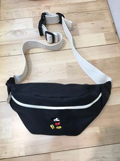 "Hip sack waist bag with multi pockets One size  Width 25cm / 10\" Length 14cm / 5.5\" Fabric and Care Polyester 100%  Machine washable and tumble dry  Made in S Koreas" Hip Bag, Waist Bag, Disney Trips, Fanny Pack, Black