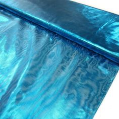 an image of a blue sheet that is laying on the ground