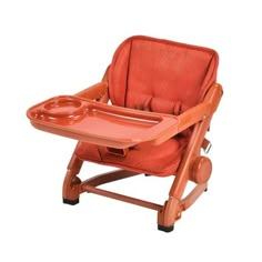 an orange baby high chair with wheels and tray on the seat, isolated against a white background